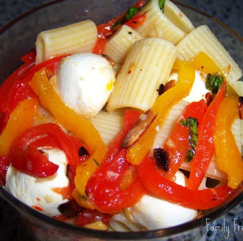 Roasted Pepper Pasta Salad served in a glass bowl