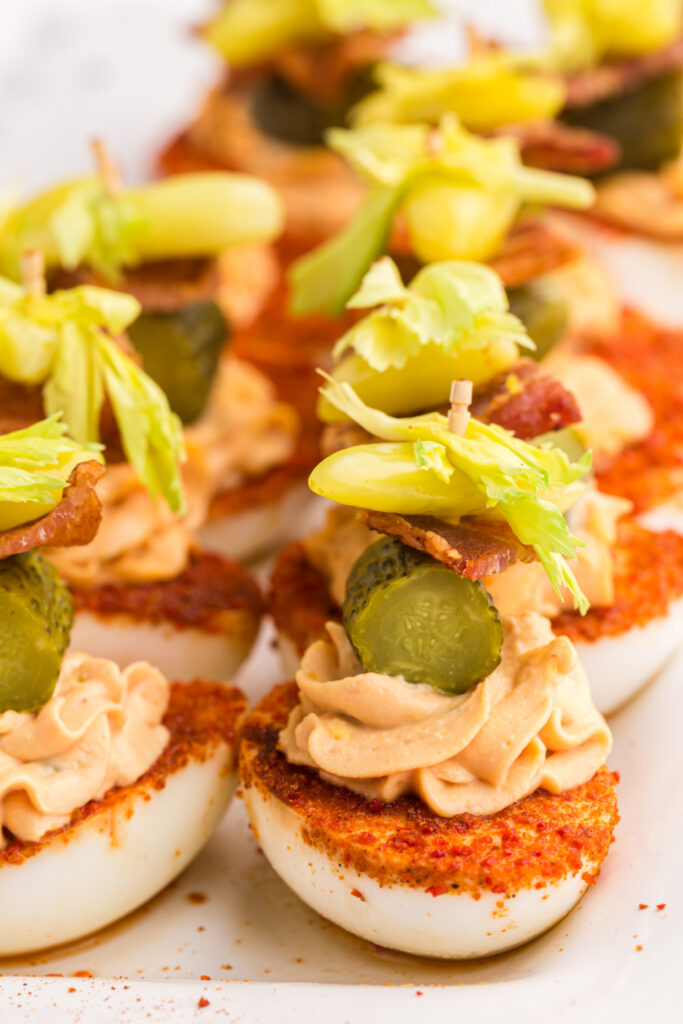 Bloody Mary Deviled Eggs on a platter