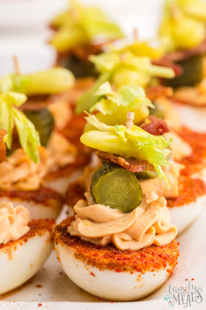 Bloody Mary Deviled Eggs on a platter