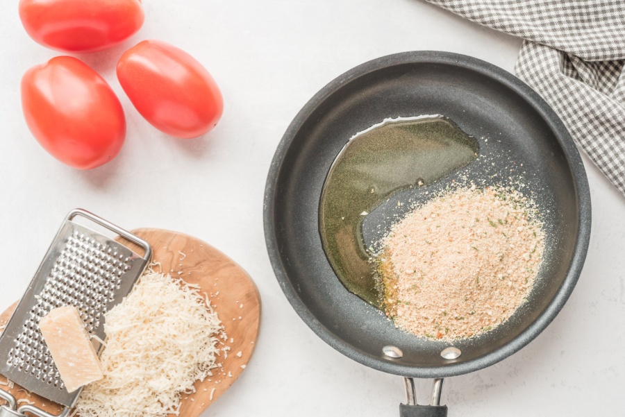 oil and bread crumbs in pan