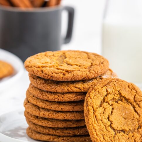 Chewy Gingersnap Cookies stacked on a plate