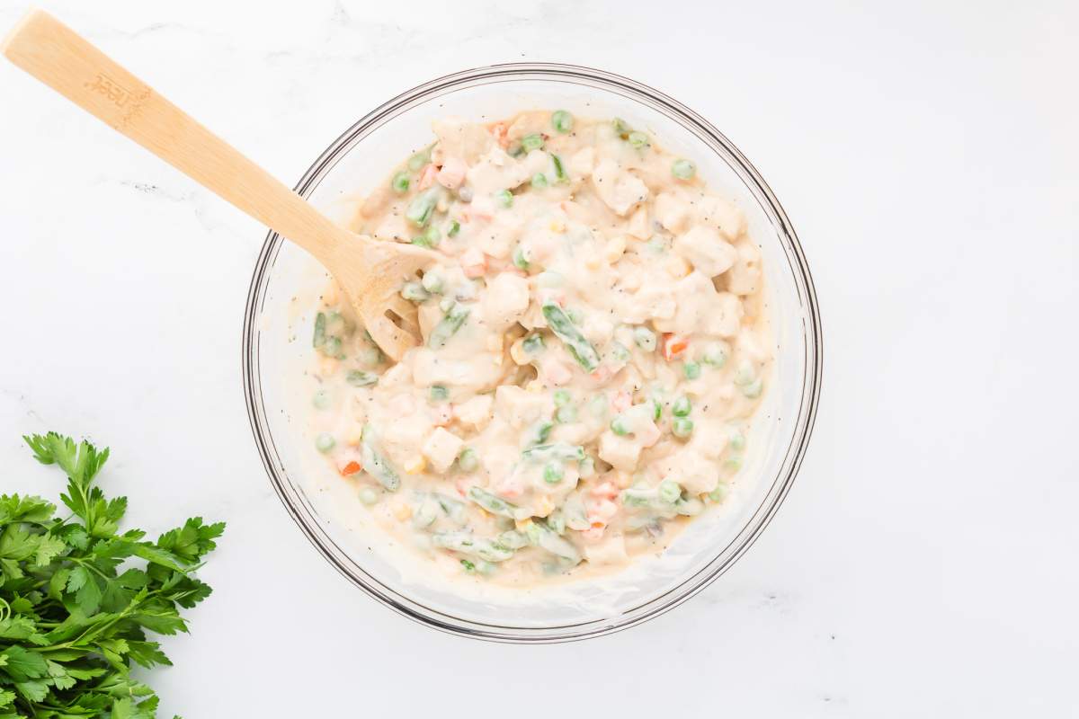 chicken and veggies added to bowl