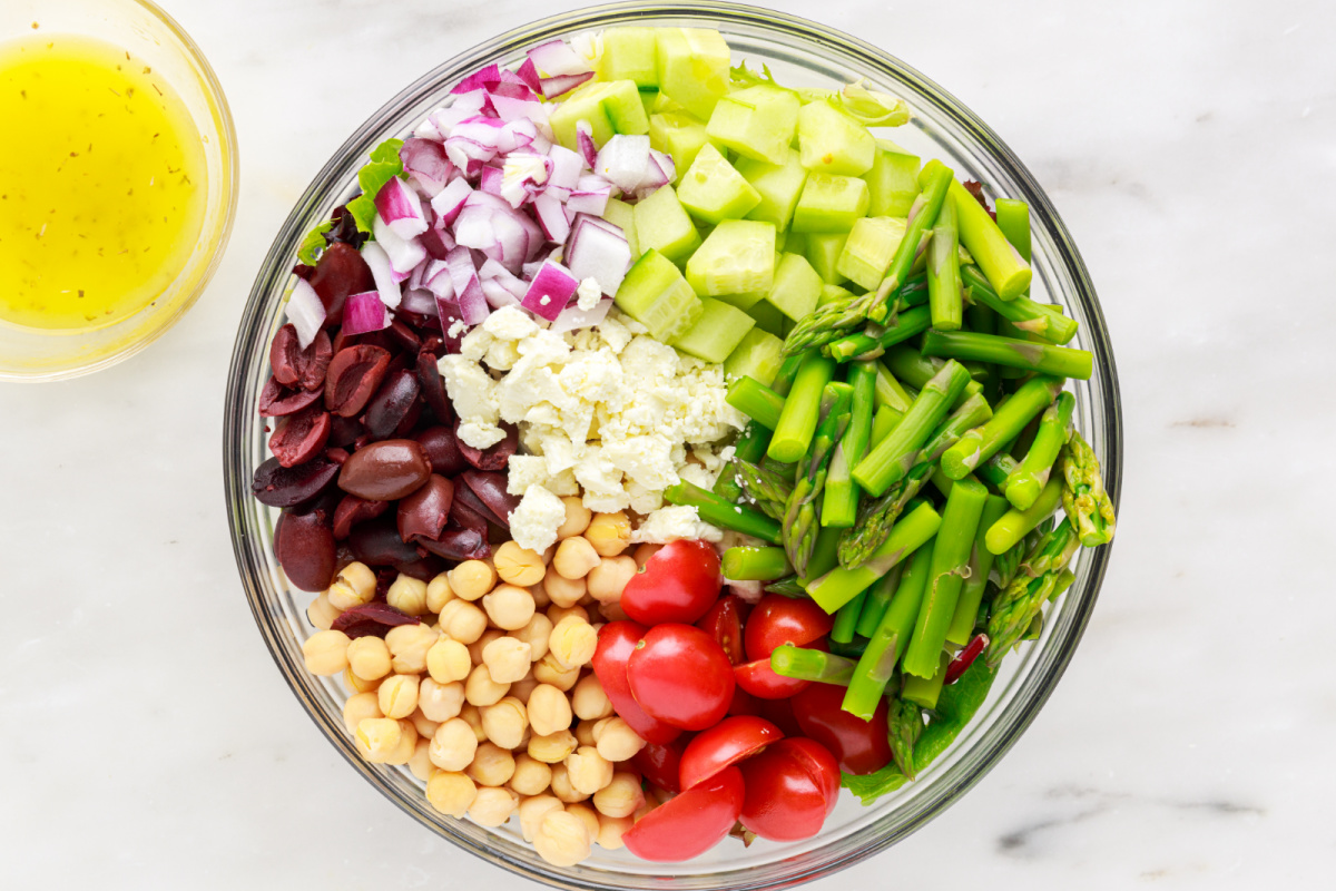 salad ingredients in a mixing bowl