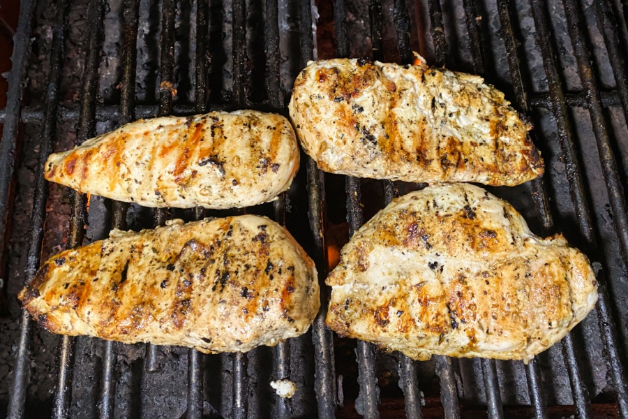 4 chicken breasts on a grill