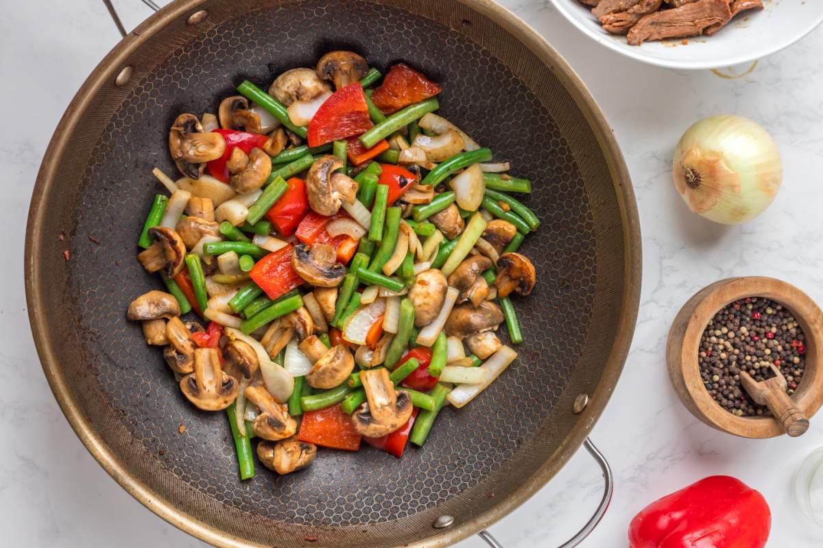 veggies cooking in pan