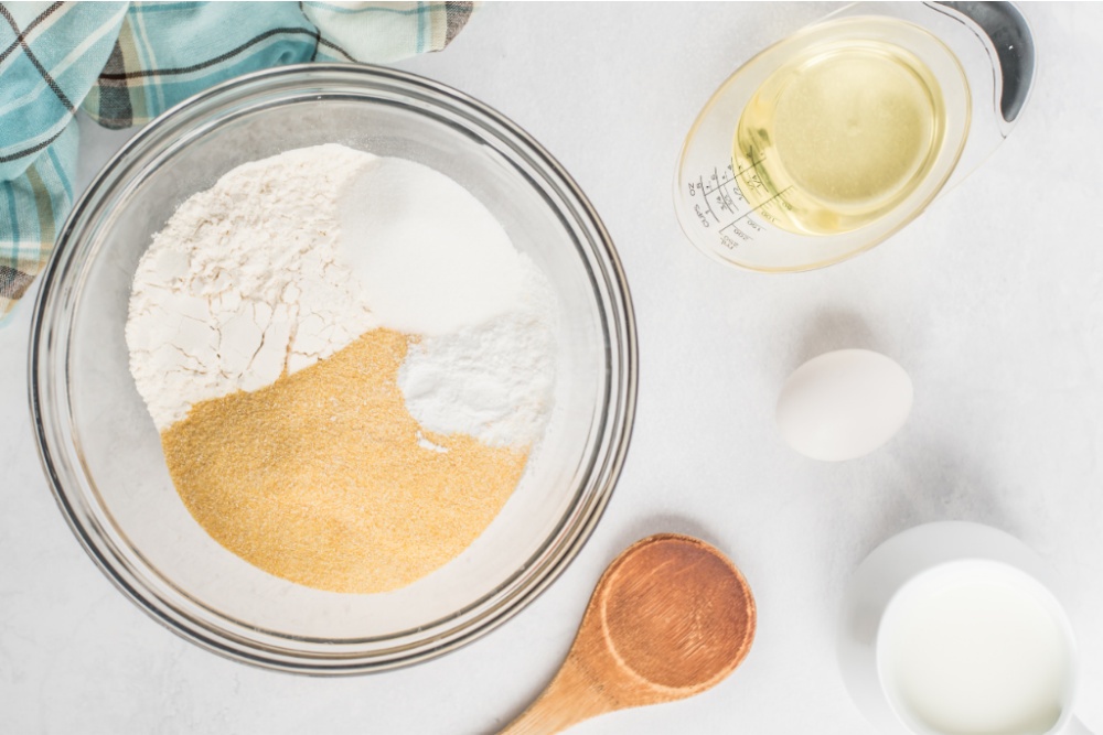 cornmeal, flour, sugar, baking powder, and salt in a mixing bowl