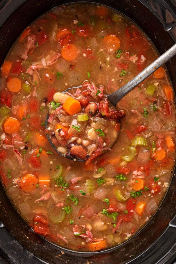 Crockpot 15 Bean Soup in slow cooker with ladle