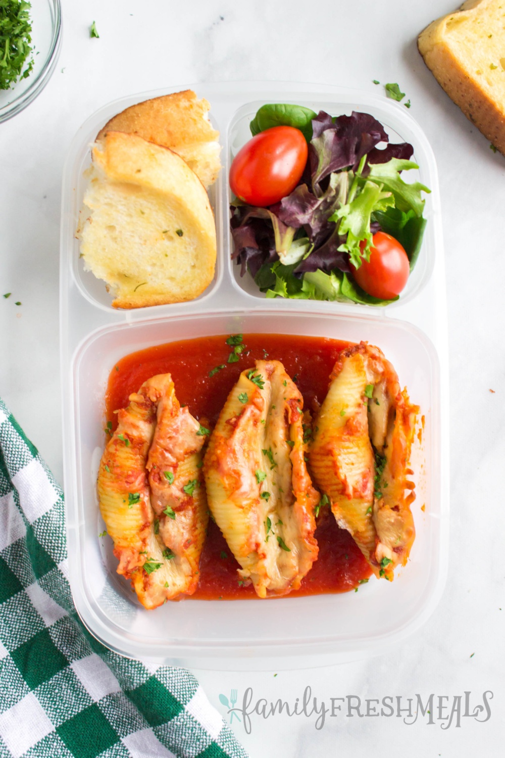 This Crockpot Stuffed Shells recipe is a meal the whole family will love. It's so easy to make, and leftovers can be frozen for later. via @familyfresh