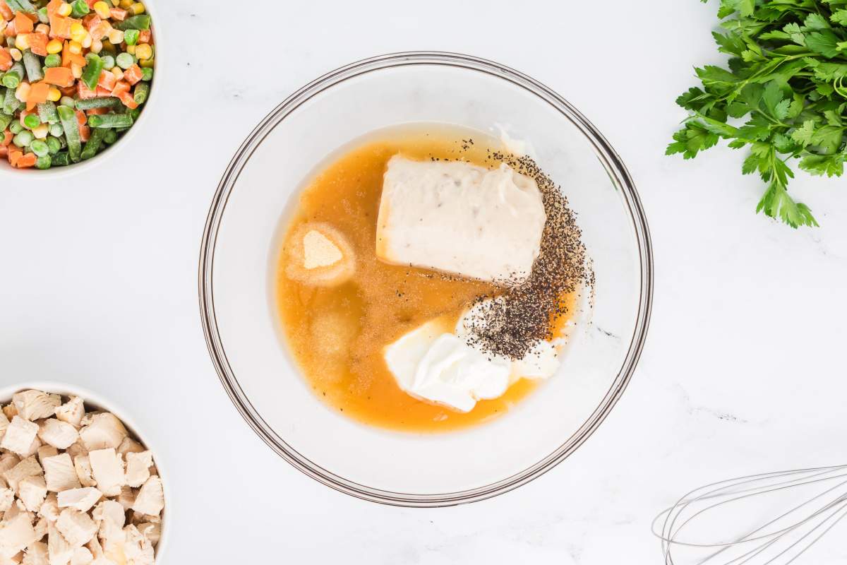 gravy, soup, chicken broth, sour cream, onion powder, garlic powder, and black pepper in a bowls