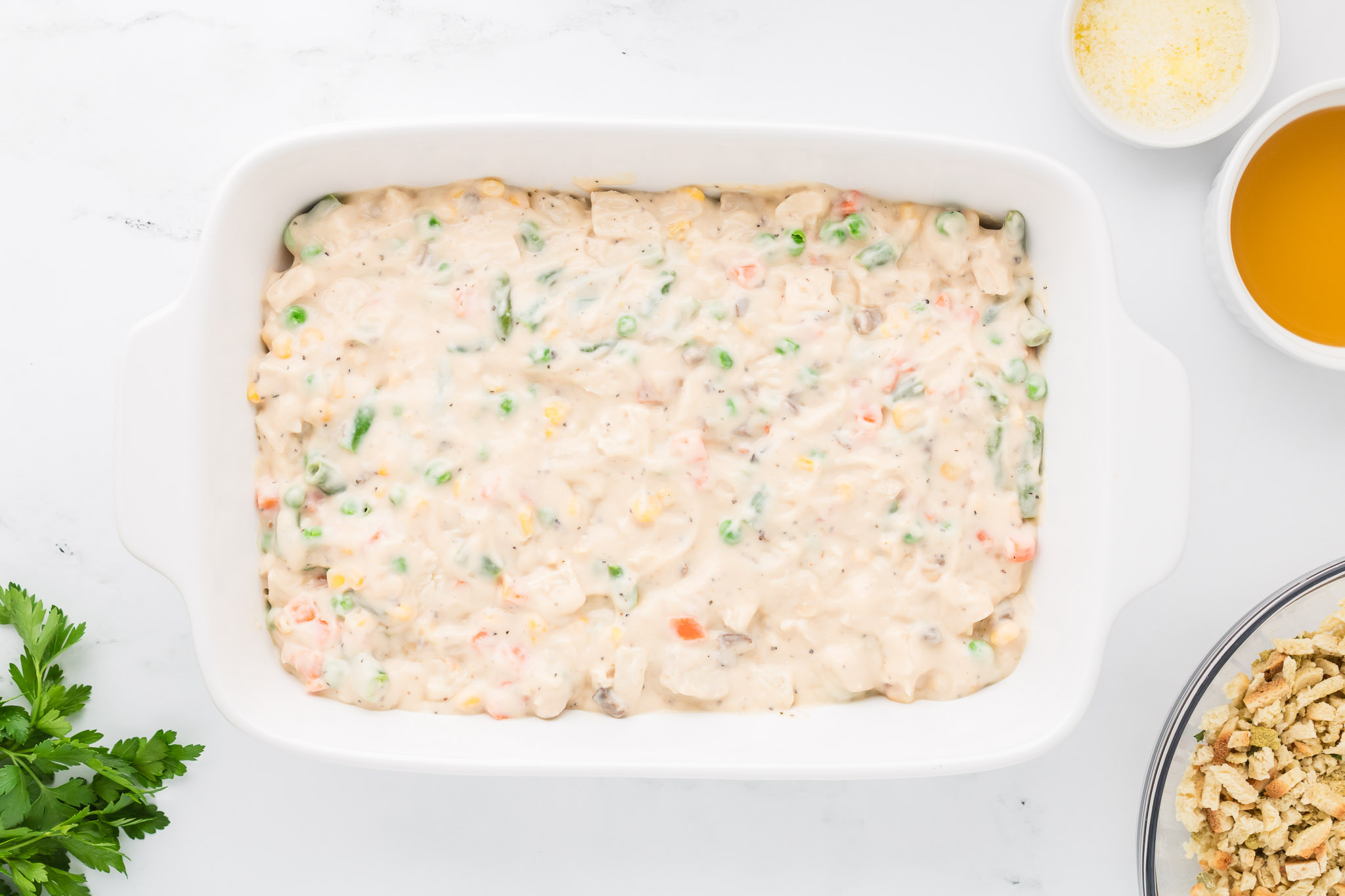 creamy mixture added to baking dish