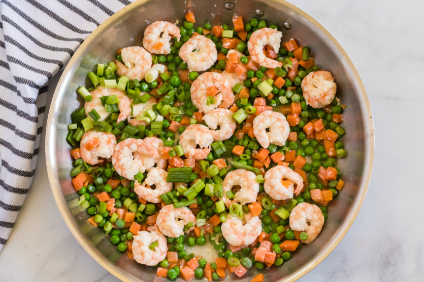 Easy Shrimp Fried Rice - green onions added into pan - Family Fresh Meals