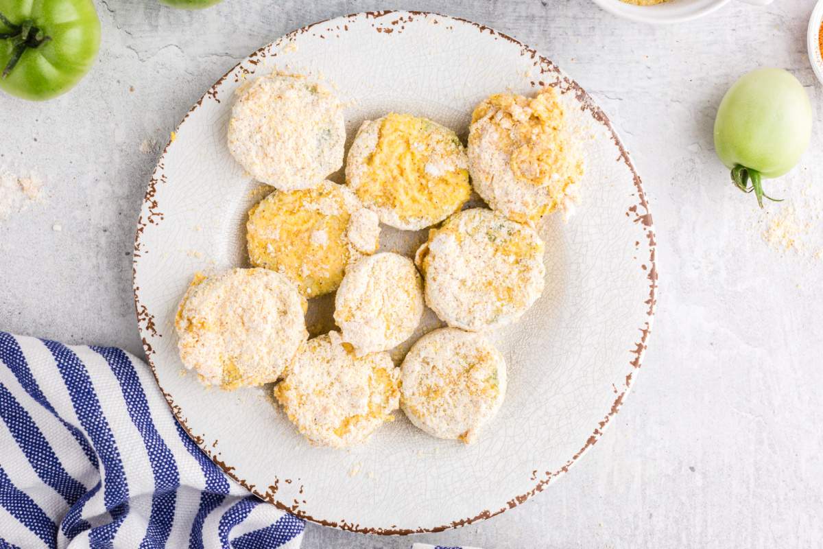 sliced tomatoes dipped in butter milk and flour mixture