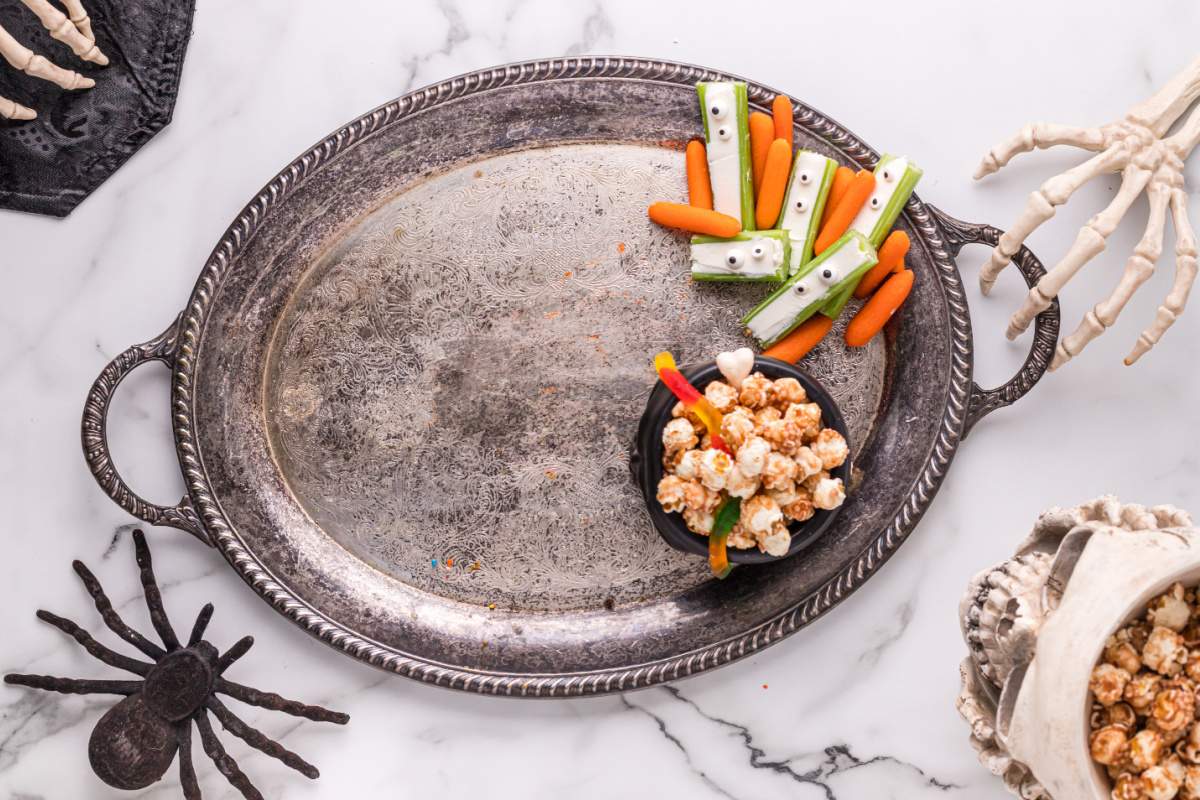 caramel popcorn, and veggies added to platter