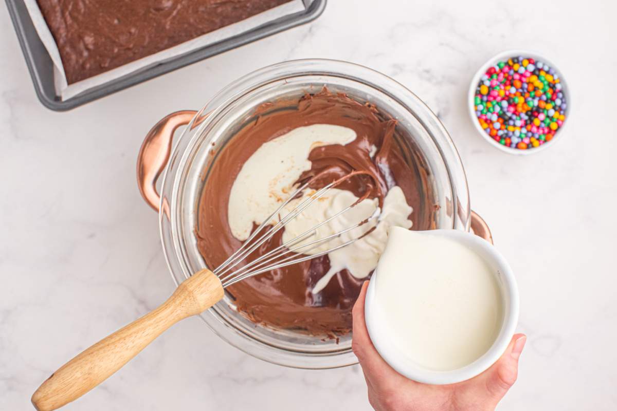 pouring cream in to bowl