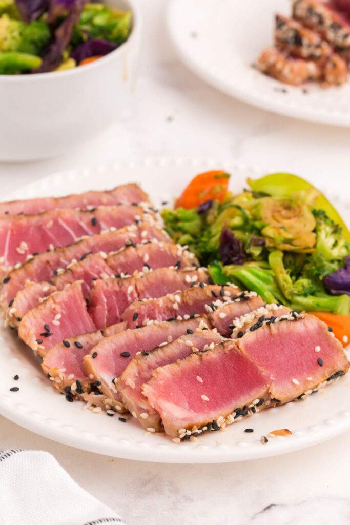 grilled ahi tuna steaks sliced on a plate