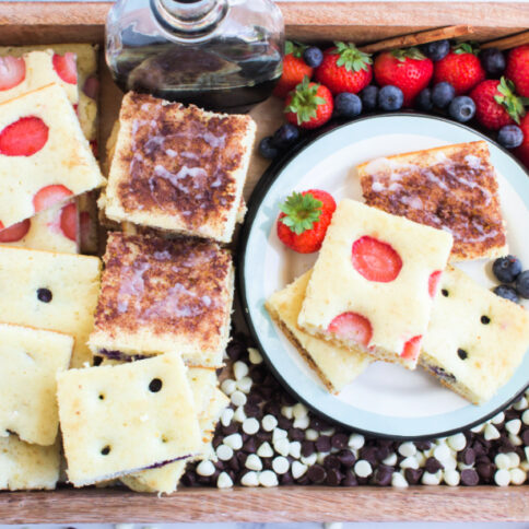 sheet pan pancakes cut up on plater and plate