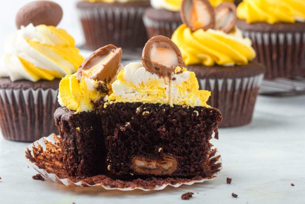 Cadbury Egg cupcake cut in half