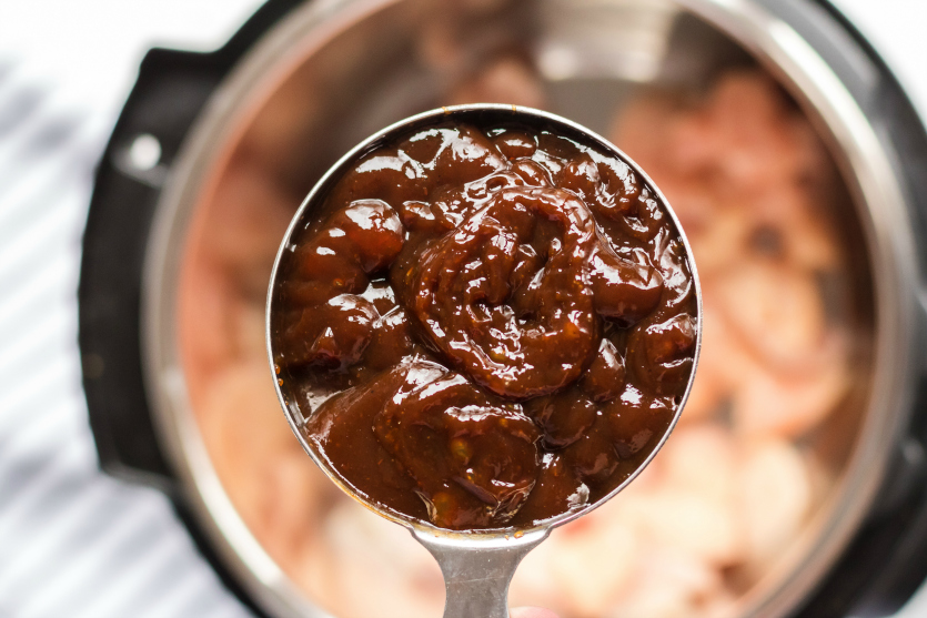 Instant Pot Orange Chicken - Sauce in a measuring cup