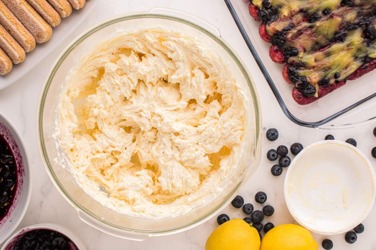 heavy cream, powdered sugar, and French vanilla pudding mix mixed in a bowl