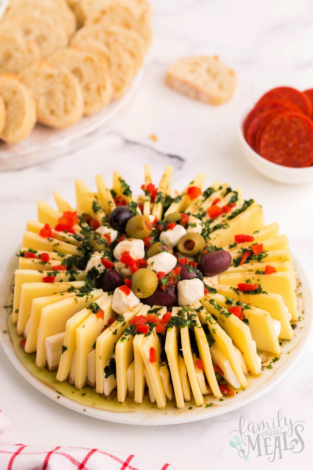 Marinated Cheese Ring on a white plate