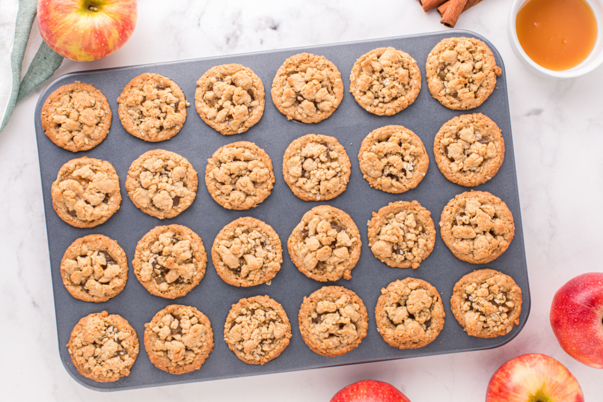 baked mini apple crisp cookie cups in baking pan