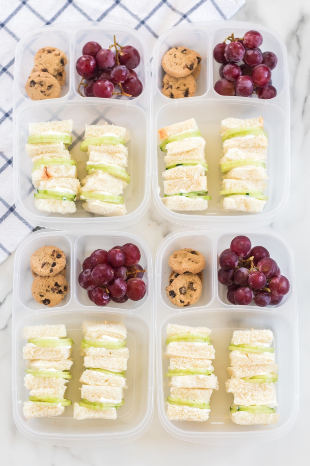 This mini cucumber sandwich lunchbox idea is a fun way to bring a little bright, elegant fun to your work or school lunch. via @familyfresh