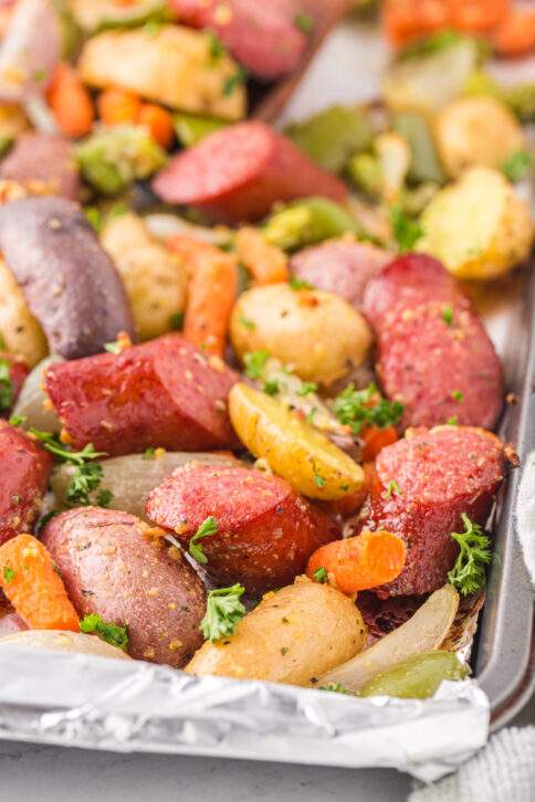 Sheet Pan Sausage and Potatoes on baking sheet