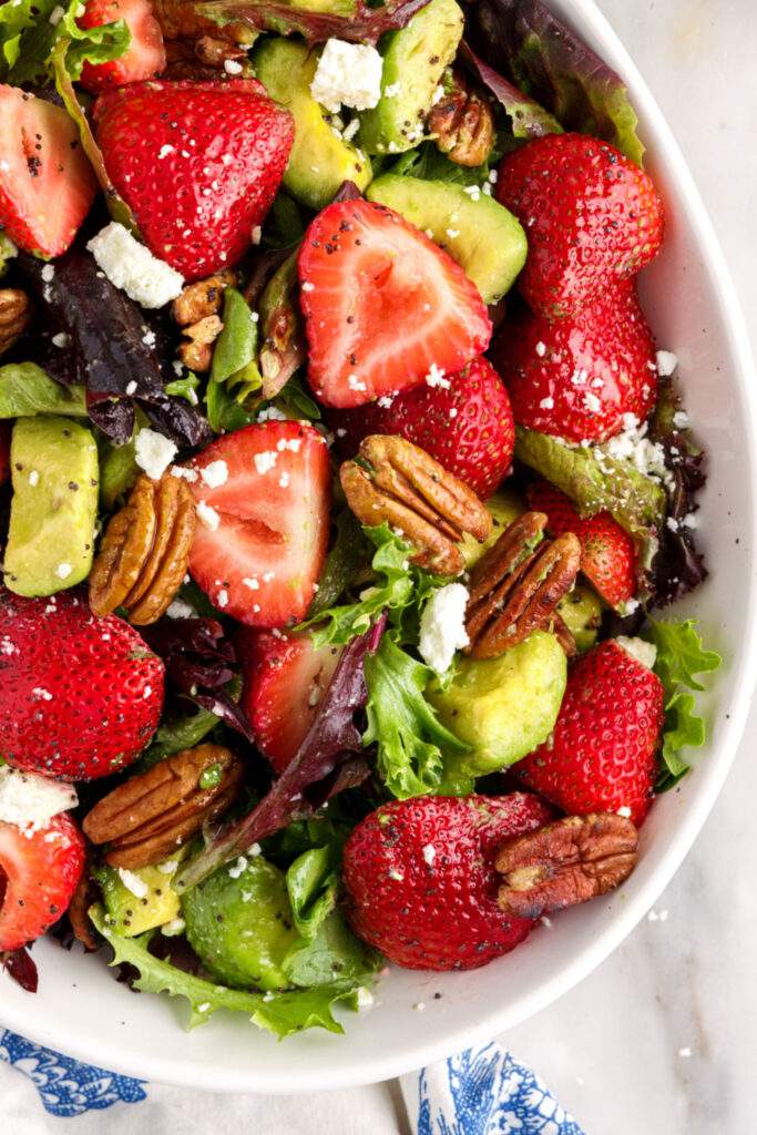 Strawberry Avocado Salad in white bowl