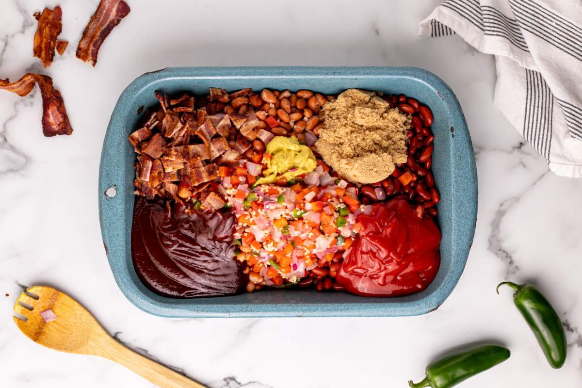 ingredients for tex-mex baked beans in a casserole dish