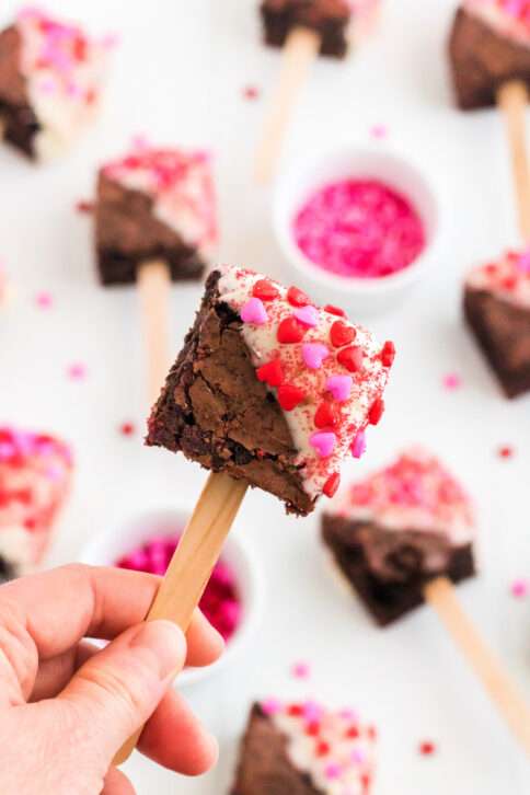 hand holding a Valentine's Day Brownie Pop