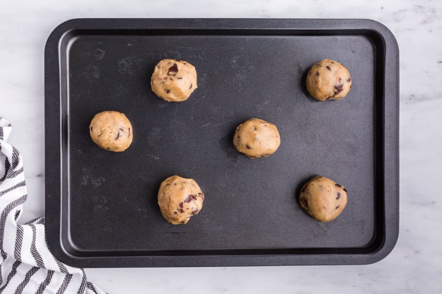 cookie dough balls on a pan