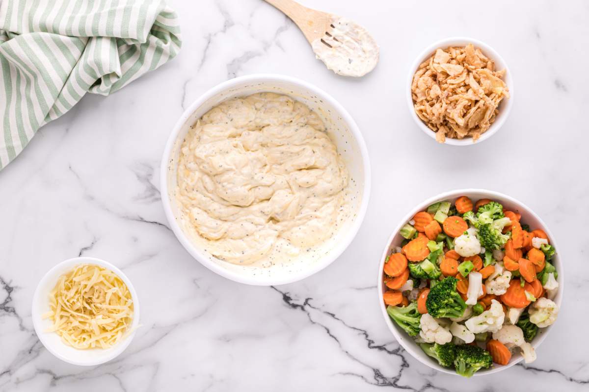 cream of chicken, chicken broth, sour cream, salt, pepper, thyme, oregano mixed in a bowl