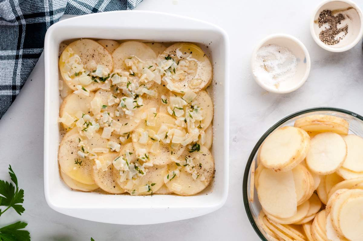 onion mixture added to top of potatoes